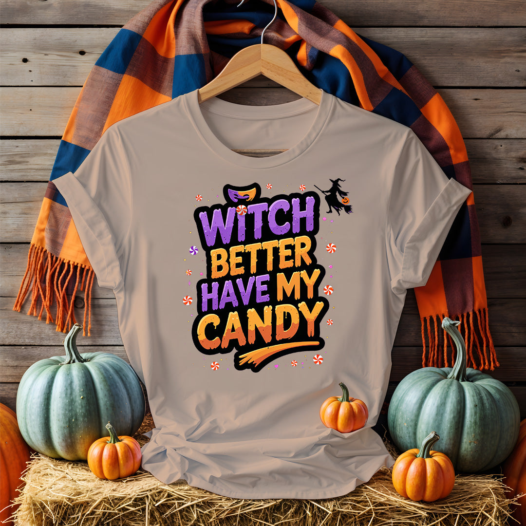 Model wearing Funny Witch Better Have My Candy Tee with pumpkin decor