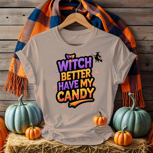 Model wearing Funny Witch Better Have My Candy Tee with pumpkin decor