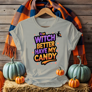 Model wearing Funny Witch Better Have My Candy Tee with pumpkin decor