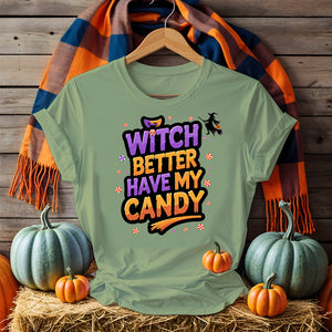 Model wearing Funny Witch Better Have My Candy Tee with pumpkin decor