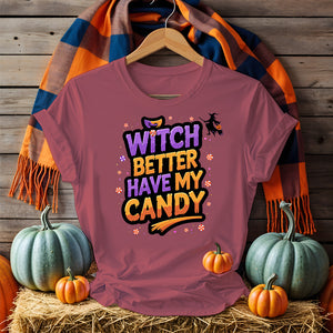 Model wearing Funny Witch Better Have My Candy Tee with pumpkin decor