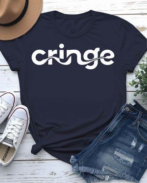 Model wearing the “Cringe” typographical t-shirt in black, smiling awkwardly, styled with denim and sneakers against a neutral background