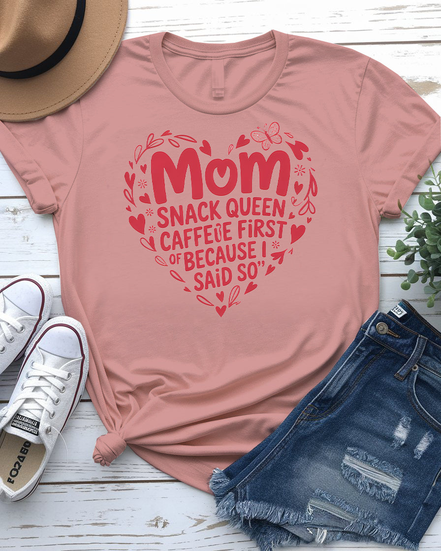 Mom Snack Queen Funny Meme Tee front view in pink color