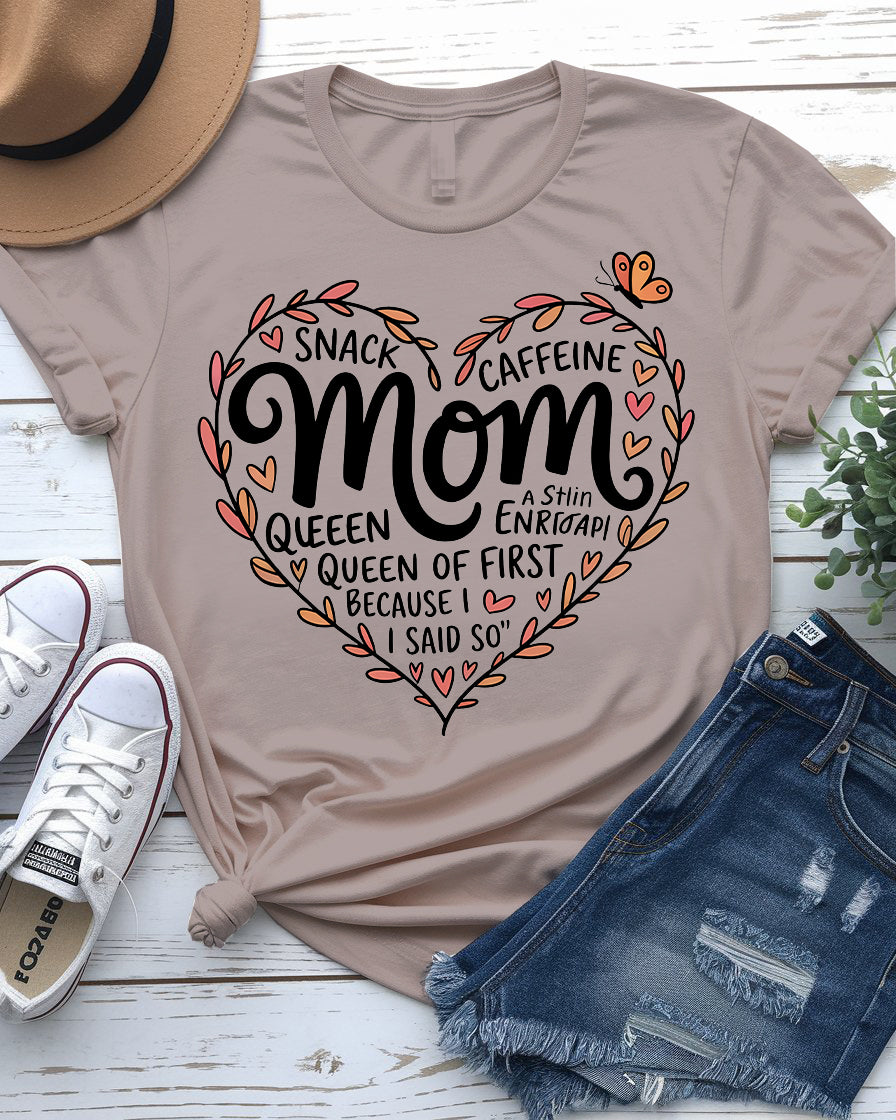 Mom wearing Snack & Caffeine Queen tee