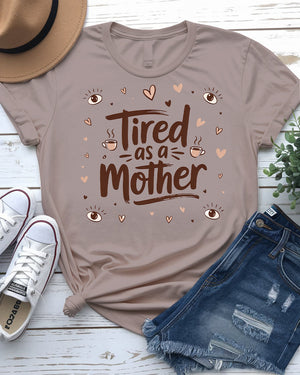 Close-up of bold typographic design: “Tired as Mother”