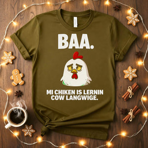 “My Chicken Is Learning Language Meme Funny Tee featuring a talking chicken wearing glasses and holding a book — funny unisex meme shirt.”