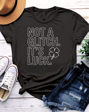 Not a Glitch It's Luck St. Patrick's Day Tee with shamrock error message on model