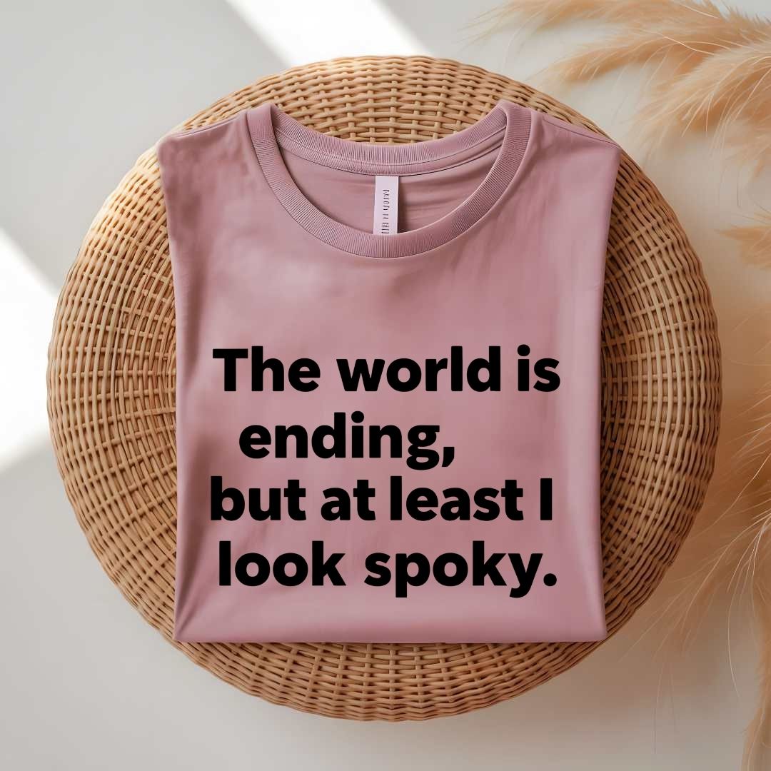 Person wearing a black spooky season tee with ironic doom humor