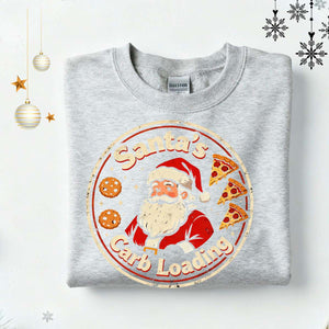 Santa’s Carb Loading Christmas Sweatshirt – funny gym and food meme holiday sweatshirt for fitness lovers by Memez.Store.”