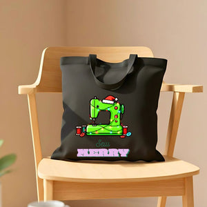 Sew Merry Tote Bag with spool and needle design