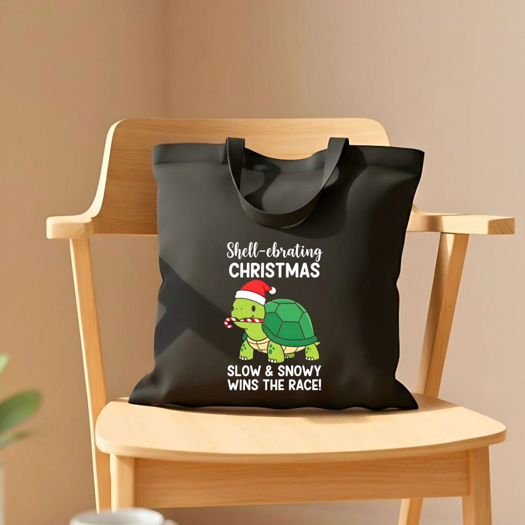 Slow & Snowy Wins The Race Tote Bag with winter pun design