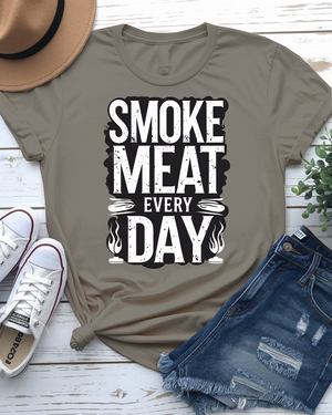 Smoke Meat Everyday Funny BBQ Meme Tee – Unisex grilling humor t-shirt with bold white text from Memez Store