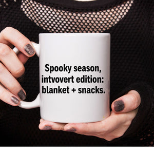 Meme-inspired Halloween coffee cup for introverts