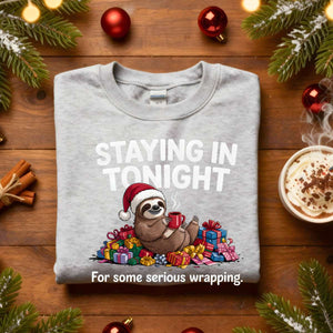 Staying Tonight Raccoon sweatshirt, funny raccoon meme cozy sweatshirt, introvert Christmas meme sweatshirt, staying in funny animal sweatshirt 2025, lazy raccoon meme apparel unisex