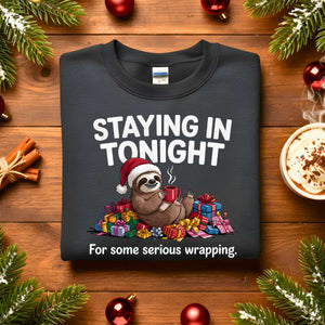 Staying Tonight Raccoon sweatshirt, funny raccoon meme cozy sweatshirt, introvert Christmas meme sweatshirt, staying in funny animal sweatshirt 2025, lazy raccoon meme apparel unisex