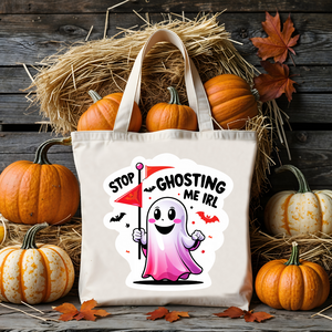 Stop Ghosting Me IRL Halloween cotton tote bag by Memez Store – black text on natural canvas bag with ghost meme design