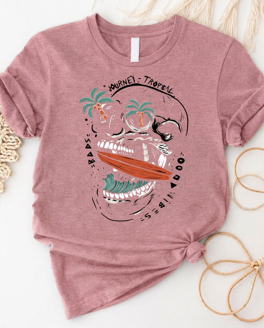 Tropical skull surfboard graphic t-shirt with bold coastal gothic design