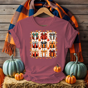 Unisex Halloween t-shirt with funny spooky meme text, printed on black and orange cotton shirt featuring pumpkins, ghosts, and bats