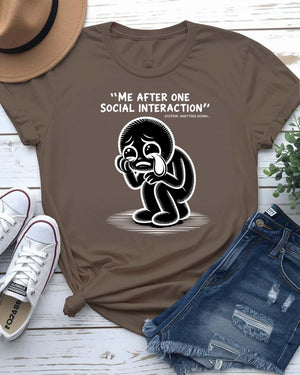 Unisex model wearing Me After One Social Interaction funny meme tee in a minimalist room setting