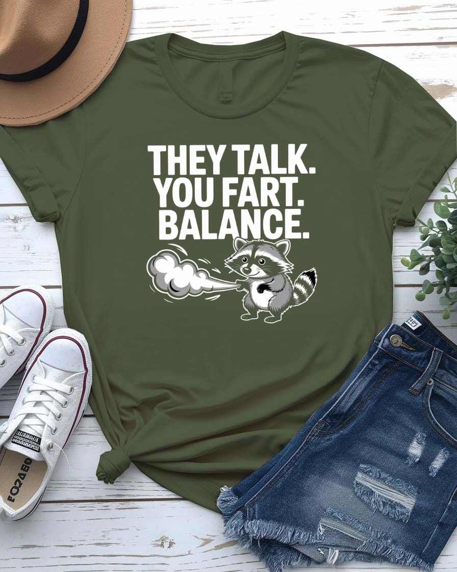 Unisex tee with the bold phrase “They Talked You Fart” in playful, modern type – a perfect shirt for awkward humor lovers.