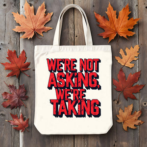 We Are Not Asking, We Are Talking Tote Bag by Memez Store – bold typographic activist design in black and white