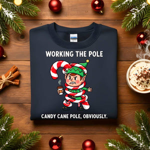 Working The Pole Christmas Sweatshirt – funny adult holiday meme sweatshirt with candy cane pole joke, cozy unisex pullover for festive humor by Memez.Store