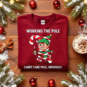 Working The Pole Christmas Sweatshirt – funny adult holiday meme sweatshirt with candy cane pole joke, cozy unisex pullover for festive humor by Memez.Store