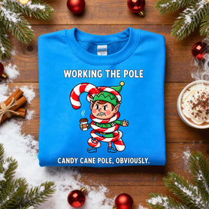 Working The Pole Christmas Sweatshirt – funny adult holiday meme sweatshirt with candy cane pole joke, cozy unisex pullover for festive humor by Memez.Store