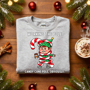 Working The Pole Christmas Sweatshirt – funny adult holiday meme sweatshirt with candy cane pole joke, cozy unisex pullover for festive humor by Memez.Store