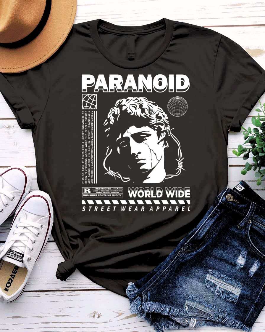 Paranoid Streetwear Tee with all-seeing eye behind chain link fence on model