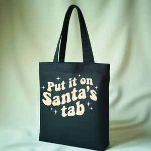 Put It On Santa's Tab Funny Christmas Shopping Tote Bag