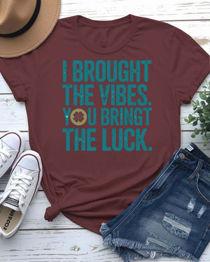 I Brought The Vibes St. Patrick's Day Tee with radiating pint glass on model