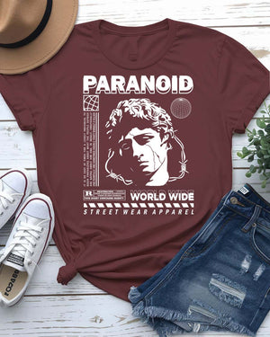 Paranoid Streetwear Tee with all-seeing eye behind chain link fence on model