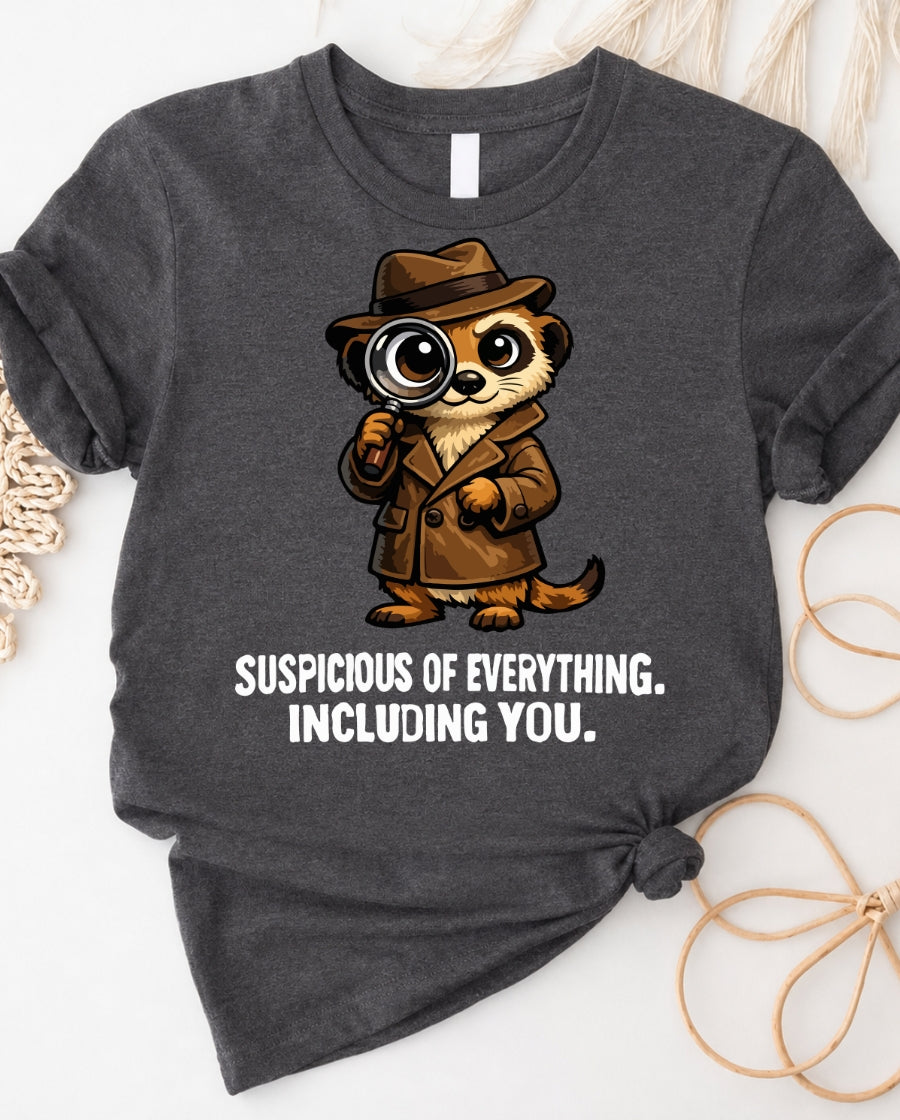 Suspicious Detective Meerkat T-Shirt — “Suspicious of Everything, Including You.”