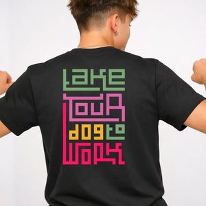 Take Your Dog To Work typographic tee with paw prints on design on model