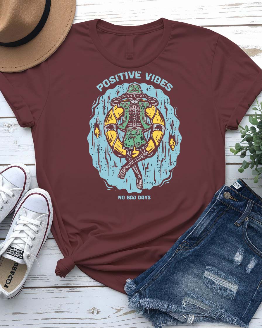Positive Vibes streetwear tee with minimalist sunburst graphic on model