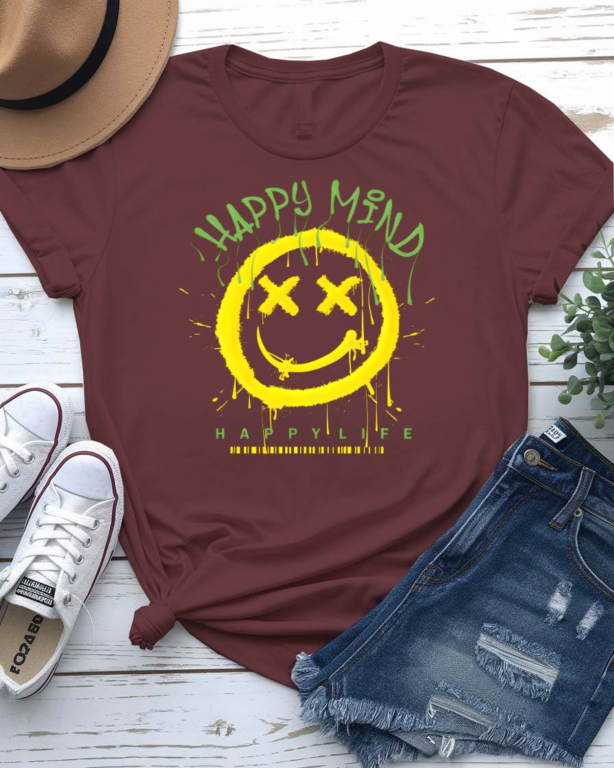 Happy Mind Copy visionary split-design tee on model in creative studio setting