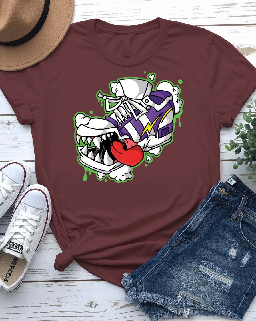 Shoes Bite Streetwear Tee with sneaker being bitten by concrete teeth on model