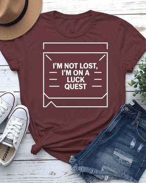 I Am Not Lost I'm on a Luck Quest St. Patrick's Tee with treasure map design on model