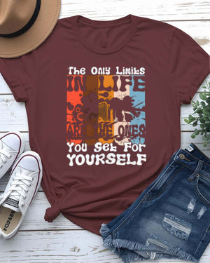 The Only Limits Streetwear Tee with figure exploding through brick wall on model