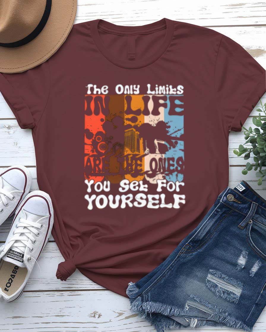 The Only Limits Streetwear Tee with figure exploding through brick wall on model