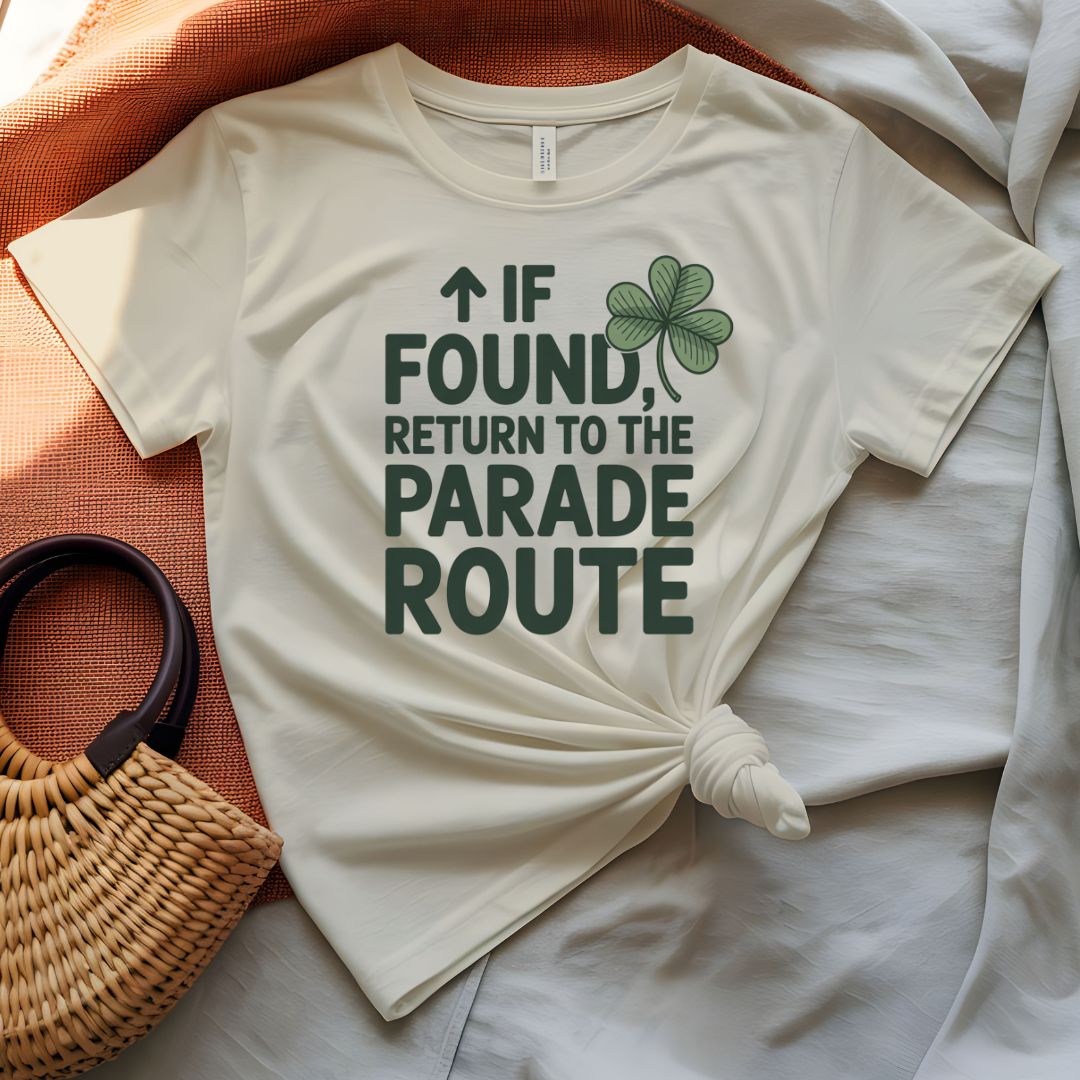 If Found Return to Parade St. Patrick's Day Tee with vintage luggage tag on model