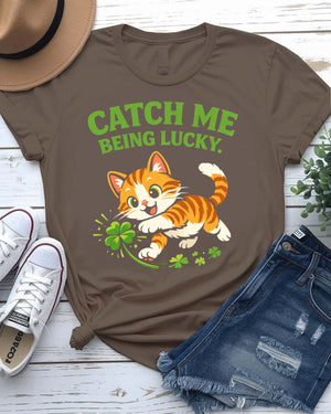 Catch Me Being Lucky St. Patrick's Day Tee with leprechaun hiding behind clover on model