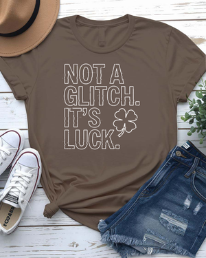Not a Glitch It's Luck St. Patrick's Day Tee with shamrock error message on model