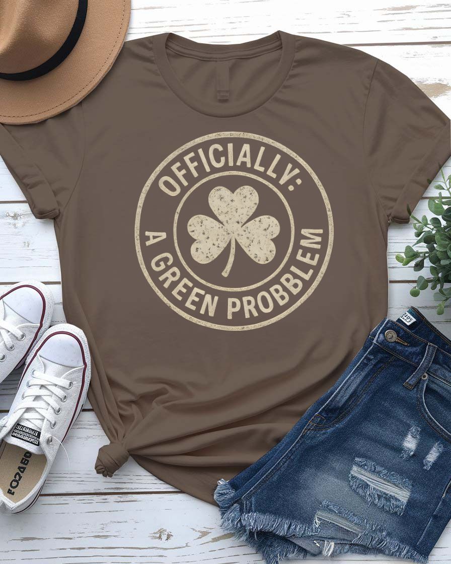 Officially A Green Problem St. Patrick's Tee with warning label design on model