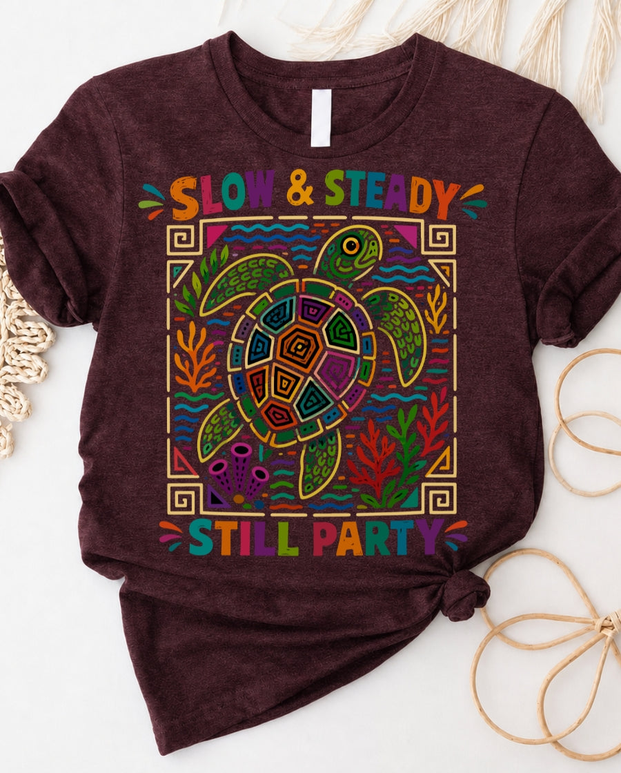 Slow and steady t-shirt with determined turtle crossing finish line design