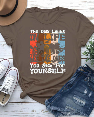 The Only Limits Streetwear Tee with figure exploding through brick wall on model