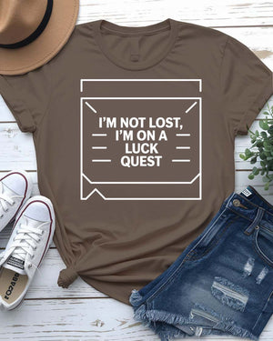 I Am Not Lost I'm on a Luck Quest St. Patrick's Tee with treasure map design on model