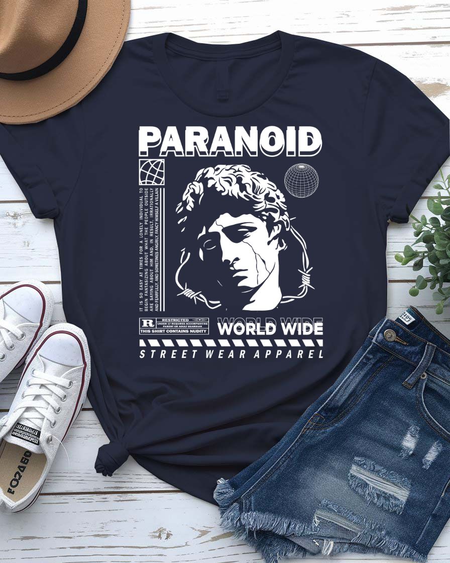 Paranoid Streetwear Tee with all-seeing eye behind chain link fence on model