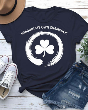 Minding My Own Shamrock St. Patrick's Day Tee with peaceful shamrock on model